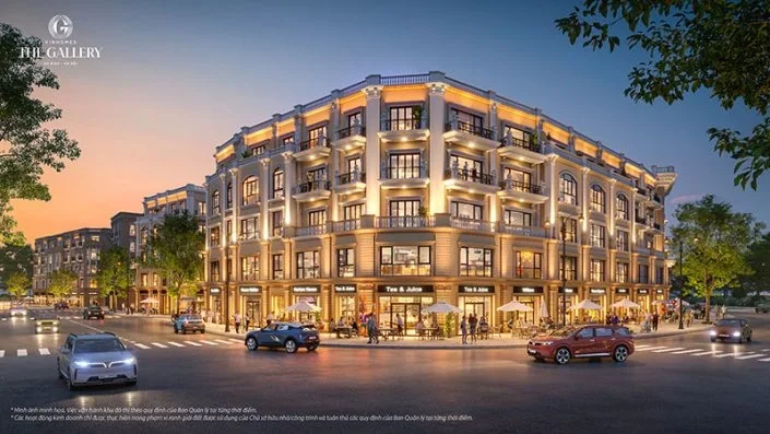 Phối cảnh góc tòa nhà thương mại The Gallery rực rỡ ánh đèn vào buổi tối, với các cửa hàng hoạt động