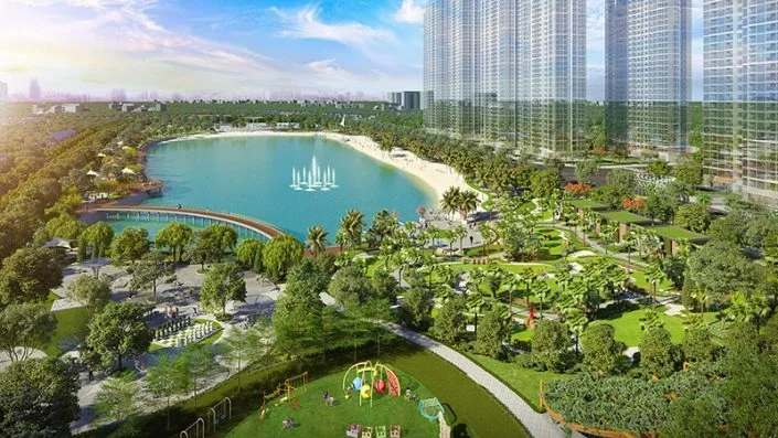 Toàn cảnh hồ điều hòa trung tâm với bãi cát trắng, công viên cây xanh và khu vui chơi trẻ em