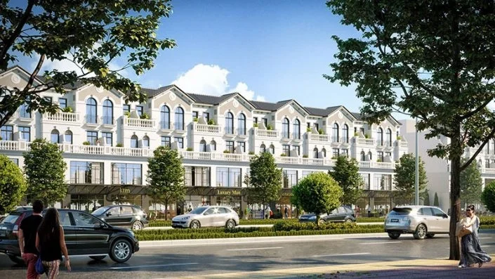 Dãy nhà phố thương mại shophouse với kiến trúc tân cổ điển, mặt tiền kinh doanh sầm uất và cây xanh đường phố