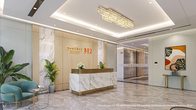 Sảnh lễ tân sang trọng của tòa The Beverly BE2 với quầy tiếp tân ốp đá cẩm thạch và đèn chùm hiện đại