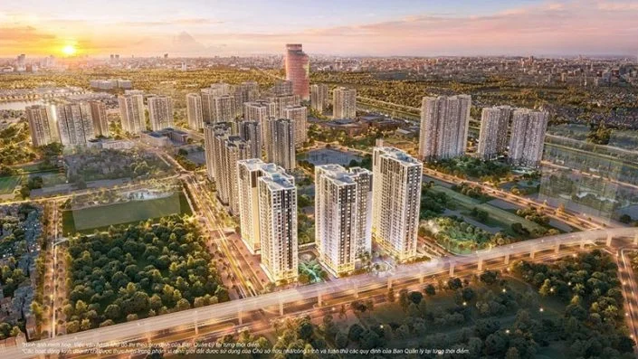 Toàn cảnh khu đô thị với nhiều tòa nhà cao tầng, cây xanh và đường giao thông lúc hoàng hôn