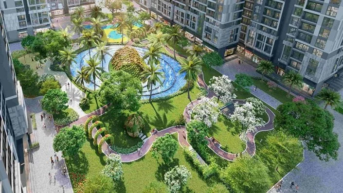 Toàn cảnh trên cao khu vườn cảnh quan nội khu với hồ nước, đường dạo bộ và cây xanh