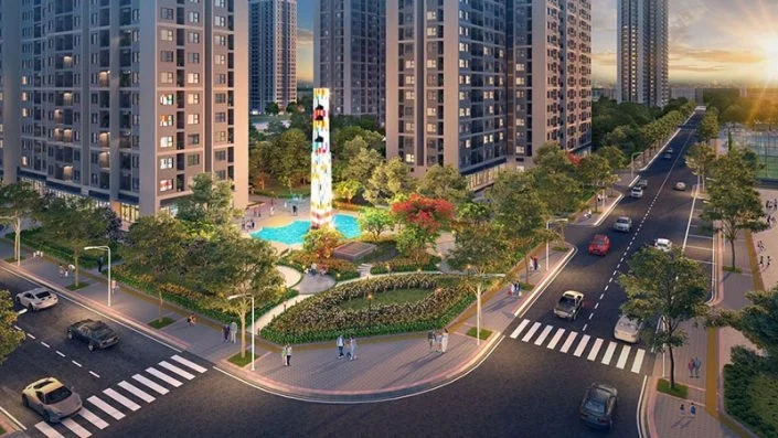 Góc phố nội khu với các tòa chung cư, quảng trường trung tâm có tháp trang trí và hồ bơi nhỏ