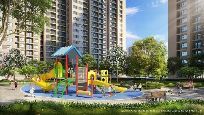 Sân chơi trẻ em với cầu trượt, xích đu và các thiết bị vui chơi khác, xung quanh là cây xanh và các tòa nhà chung cư cao tầng