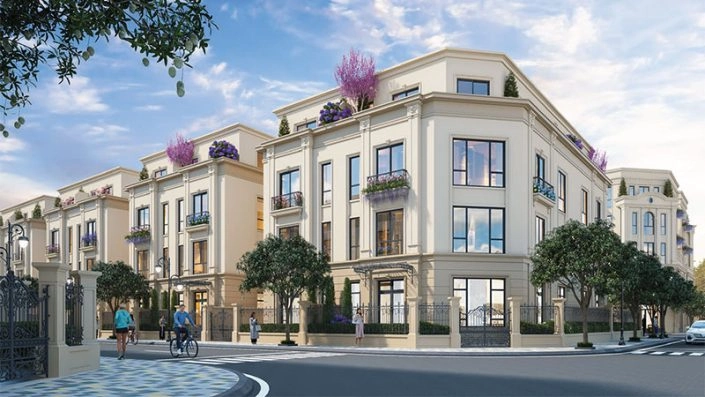 Góc phố với các căn nhà phố liền kề kiến trúc tân cổ điển, ban công trang trí hoa và cây xanh.