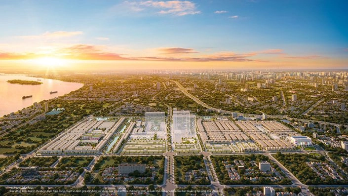 Toàn cảnh dự án khu đô thị nhìn từ trên cao, bên cạnh sông và thành phố lúc hoàng hôn