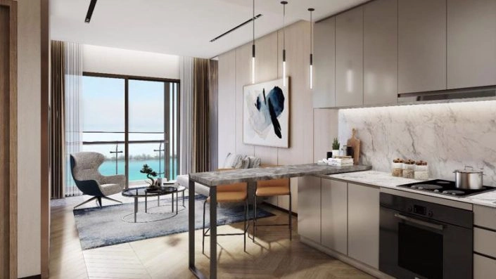 Nội thất căn hộ hiện đại với không gian bếp và phòng khách liền kề, có tầm nhìn ra biển.