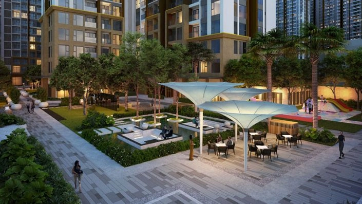 Khu vực tiện ích ngoài trời với ghế ngồi, ô che nắng và khu vui chơi trẻ em